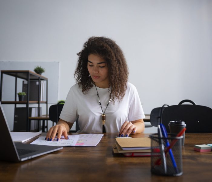 front-view-woman-working-as-economist